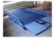 Hydraulic movable container loading ramp