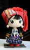 Китайское несовершеннолетие производит куклы - девушку Jingpo
