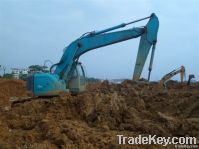 사용된 굴착기 Kobelco 235