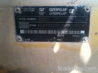 используемая землечерпалка Cat 320c