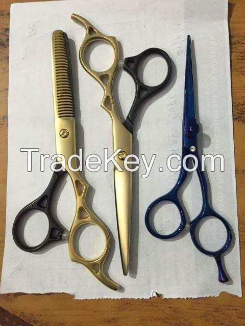 Golden scissors , titanium coated scissors