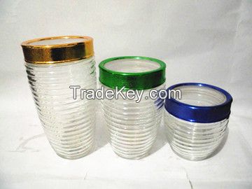 Transparent glass canister storage bottle with plastic lids