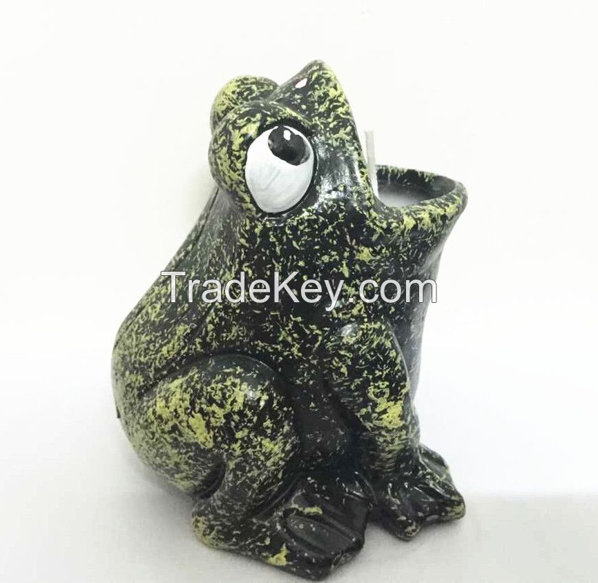 Frog Figurine candle holder with citronella wax filled.