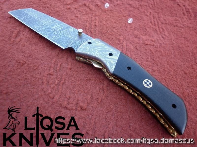 Custom made Damascus steel folding knives