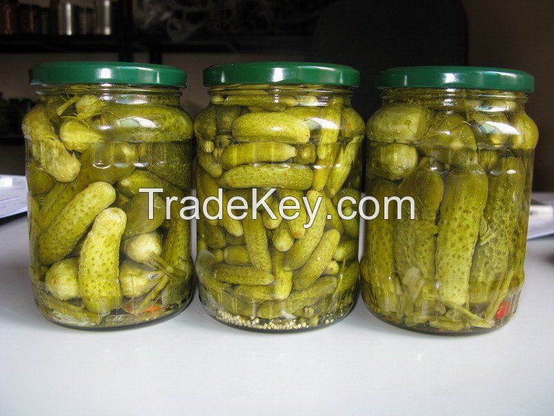 Pickled cucumbers, baby cucumbers in brine in glass jar