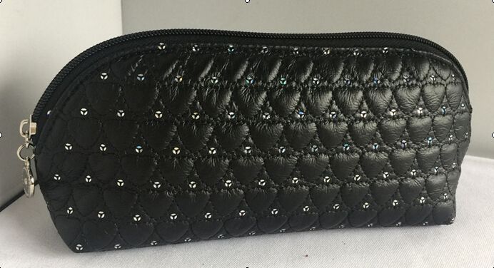 quilted PVC cosmetic bag with sequin