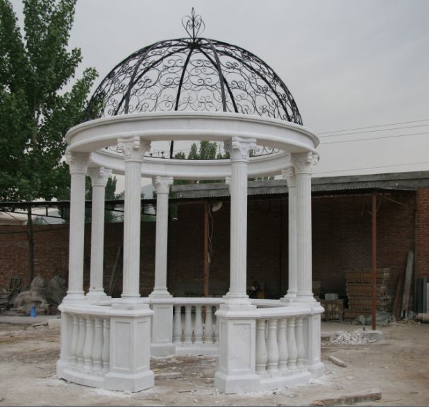 Nice hand carved column gazebo with iron roof