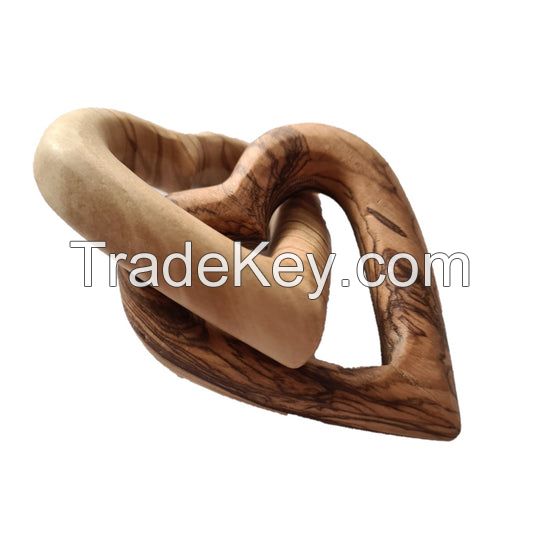 Entwined olive wood together hearts