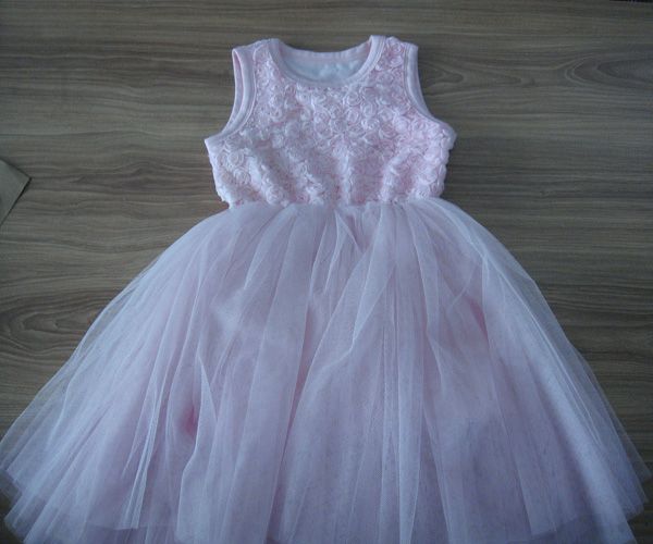 Very cute and trendy sleeveless rosette light pink baby tutu dress