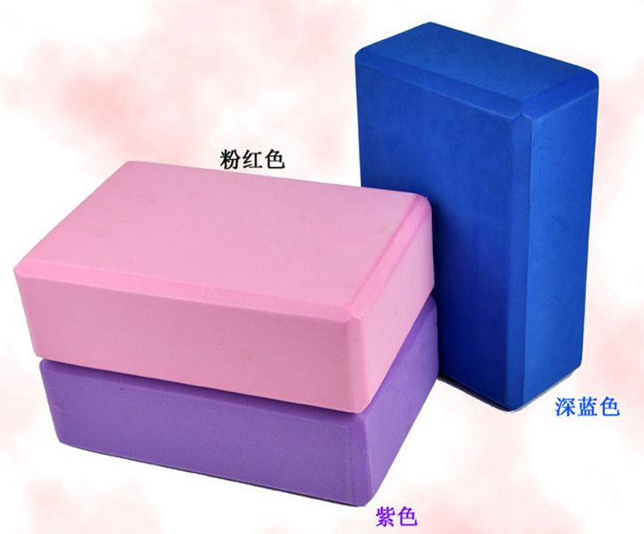 Yoga blocks in blue, pink, purple color