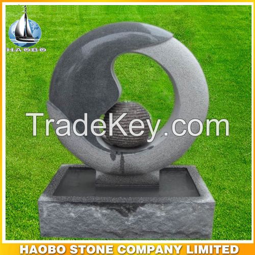 Dark grey water feature , fountain for garden decoration