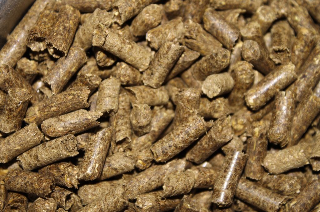 6 mm Hay pellets for burning. They burn just as well as wood pellets, but hay pellets are cheaper.