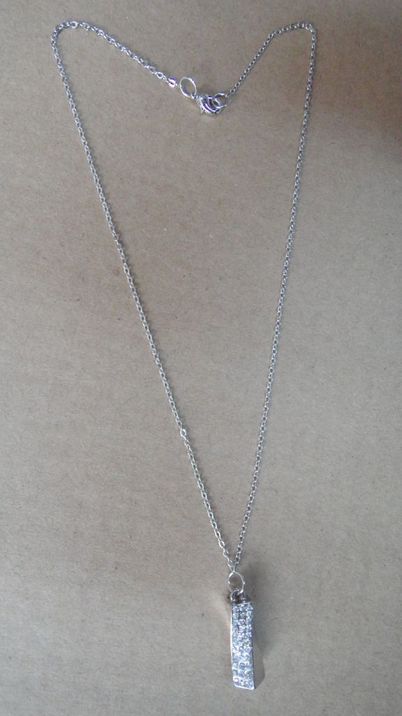 necklace with small casting with pave stone