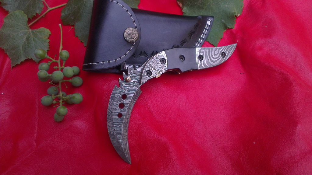 Damascuse Folding Knife with leather Sheat