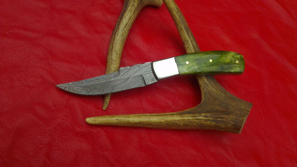 damascuse knife with colour Bone and steel Bolsters