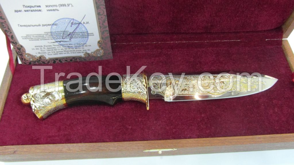 Knife souvenir decorated with gilded