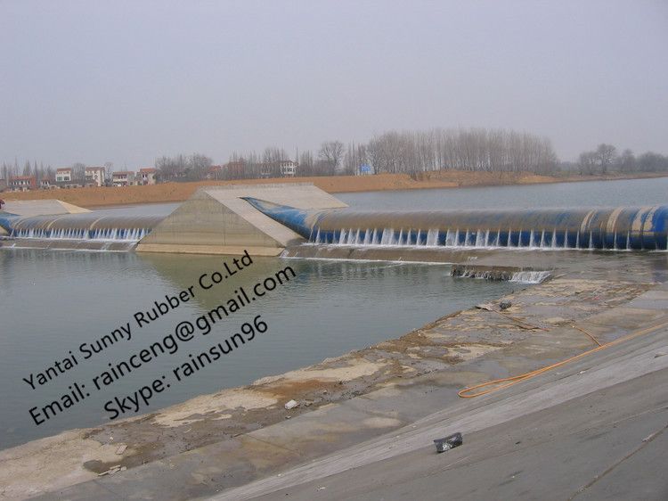 Inflatable flexible membrane dam