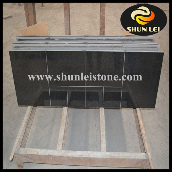 black granite fireplace hearth/granite back panel/stove bottom panel