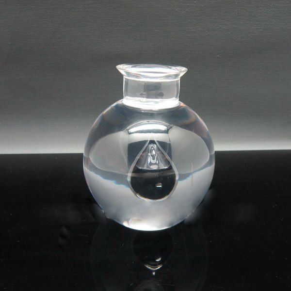 acrylic oil paperweight in bottle shape