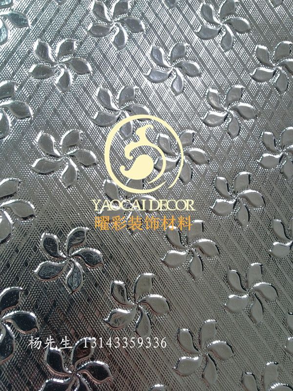 Decorative pvc sheet with embossed metallic surface
