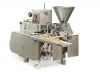 Filling and wrapping machine of processed cheese