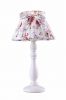 Table lamp with flower skirt shade
