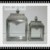 Metal lantern with glass pannel