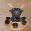 Sell cast iron fondue set