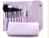 makeup brush set in the purple cosmetic bag