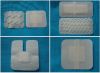 Non-woven adhesive dressing