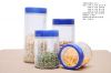 Sell clear glass storage canisters with plastic lids