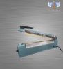 Hand impulse sealing machine with side cutter