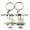 Sell Lovely rabbit design metal lovers keychain promotional gifts