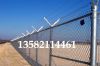 Top barbed wire chain link fence