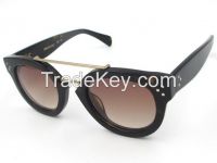 New Pretty combines a strong thick acetate frame with metal brow and bridge Sunglasses for women