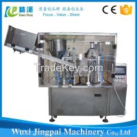 Automatic toothpaste or cosmetic tube filling and sealing machine