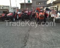 Used agricultural equipment and heavy equipment.