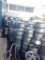 Used alloy wheel scrap, stripped copper cable scrap, motor generator scrap, compressor scrap load