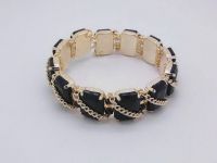 Gold chain with black rhinestone bangle