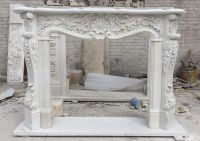 Classic hand carved stone fireplace mantel
