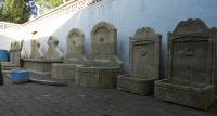 Antiqued garden wall fountains