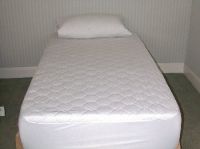Sell quilted mattress protectors,bed spreads,comforters