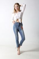 Woman's slim denim jeans with embroidery and sparkling