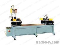 Double-head corner crimping machine