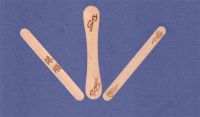 ice cream sticks and spoons with logo