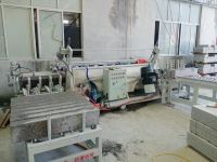 Automatic curbstone chamfer and grinding machine