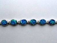 Sell created opal 925 sterling silver bracelet