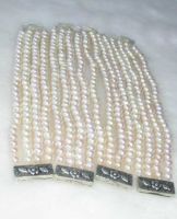 Sell Wholesale 4 pcs. 7.5" white pearl silver clasp bracelet