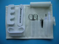 Sell non-woven manicure sets(nail files,nail clippers,tweezers)