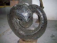 modern abstract sculpture metal technique